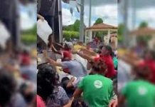 Cena de humilhação em Anapurus/MA em que peixes são jogados para a população na Semana Santa